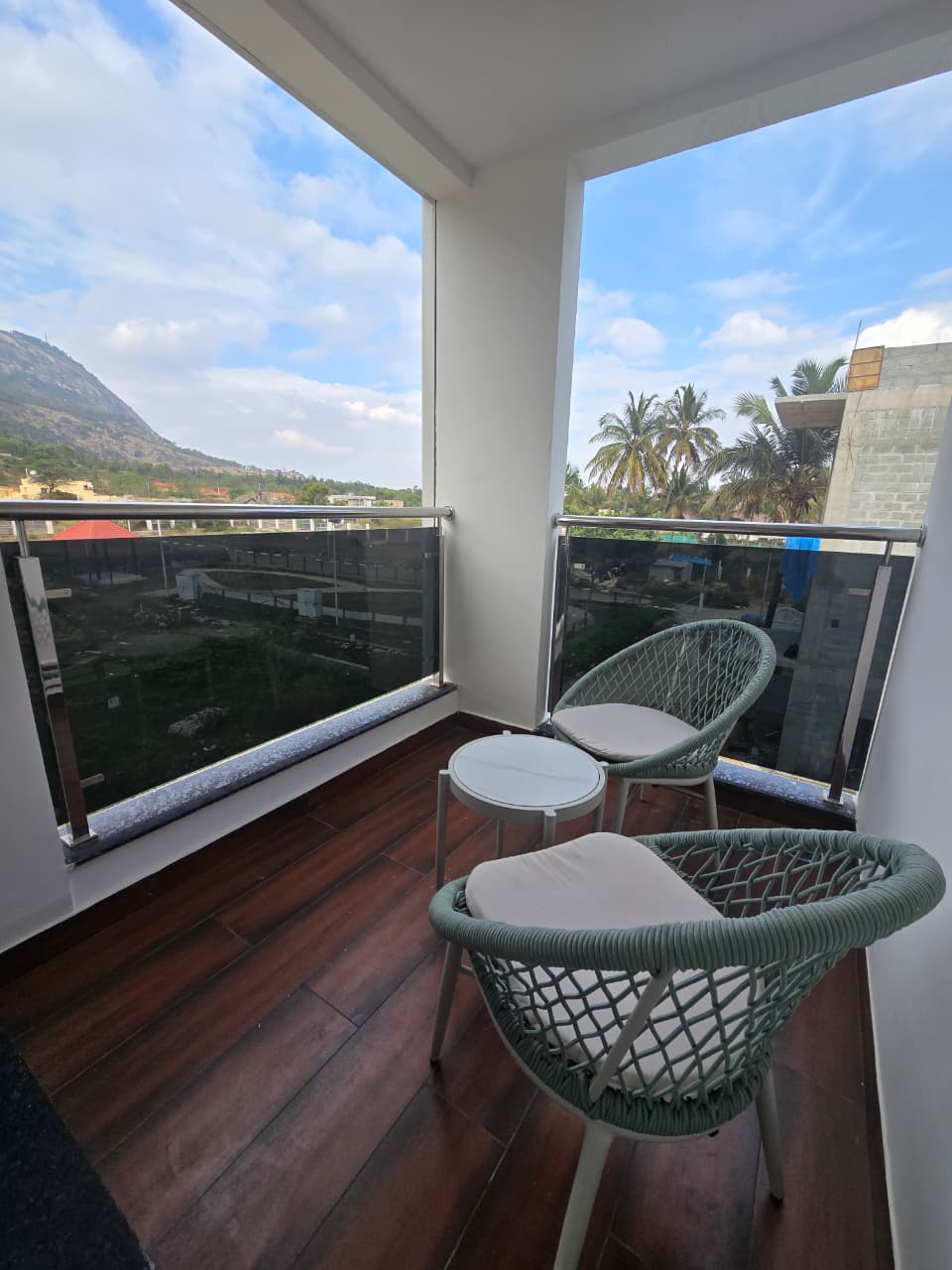 Balcony seating with valley views at Misty Mountains